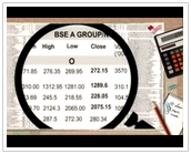 Reading stock prices in the newspaper